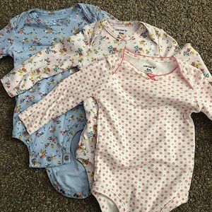 3 Carter’s baby girl onesies